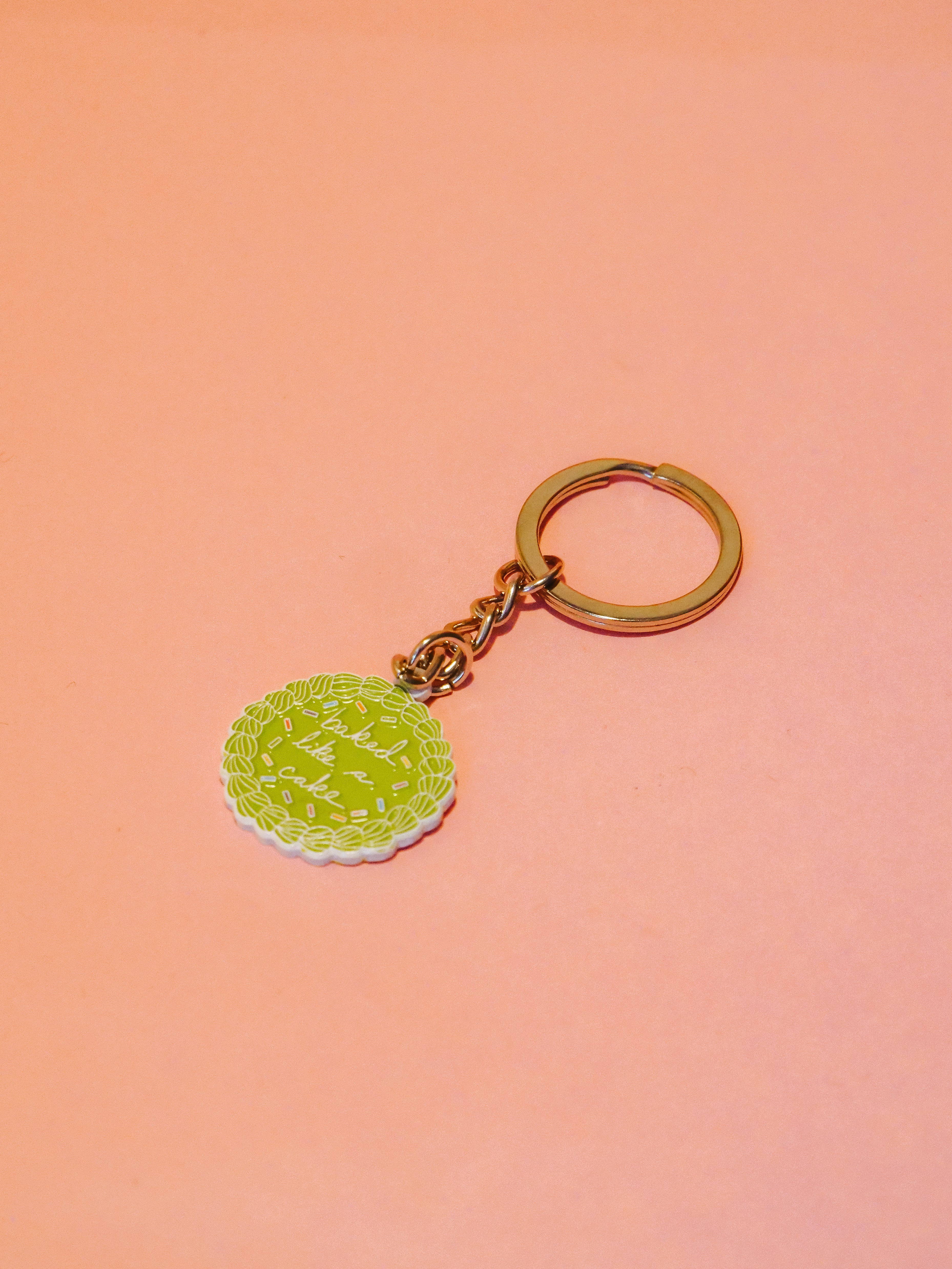 Baked Like A Cake Enamel Keychain